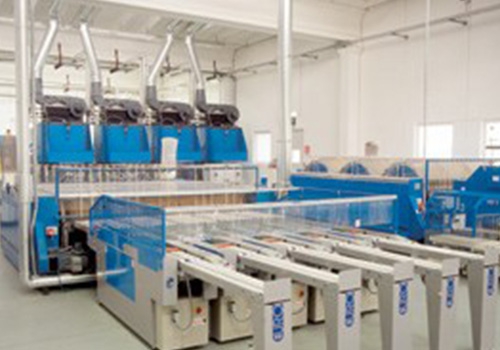 Automation and supervision of automatic machines for industrial laundry